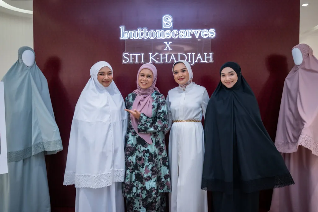 Telekung Siti Khadijah collection displayed by models at fashion collaboration event