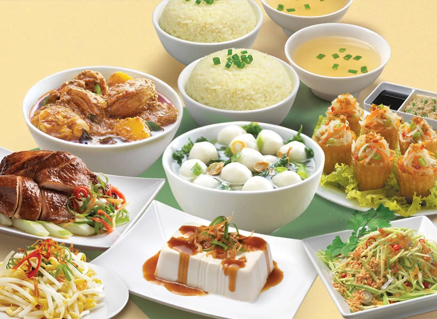 The Chicken Rice Shop signature dishes including chicken rice and Malaysian side dishes